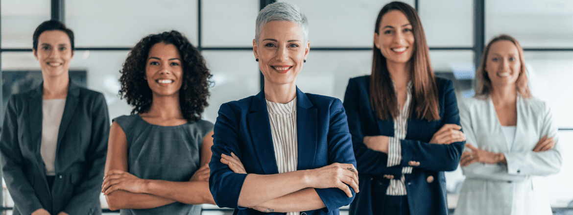 Five women in tech with arms folded